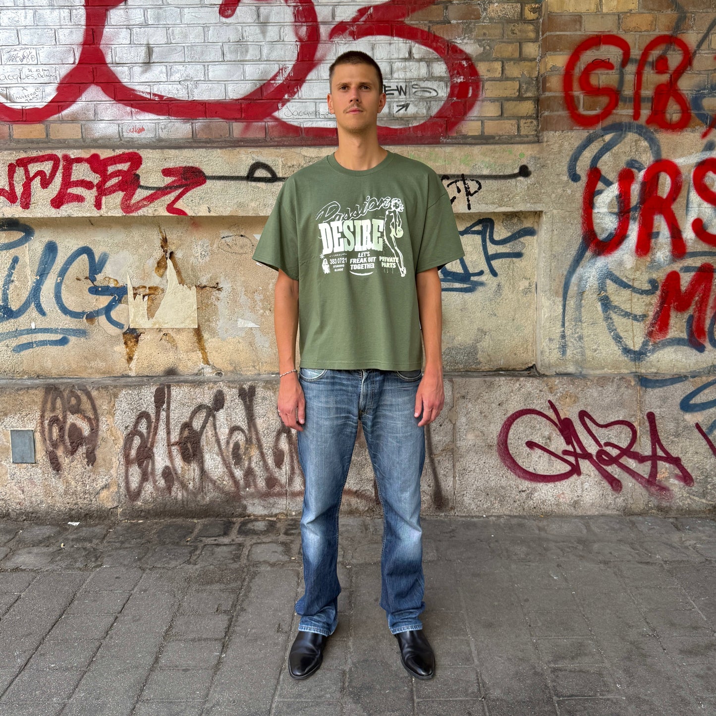
                  
                    DESIRE T-SHIRT (OLIVE/GLOW IN THE DARK)
                  
                