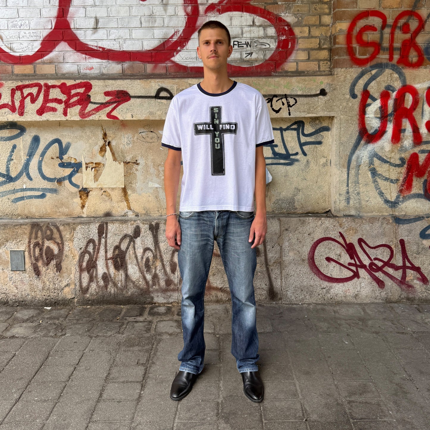 
                  
                    SINNERS RINGER T-SHIRT (GLOW IN THE DARK)
                  
                
